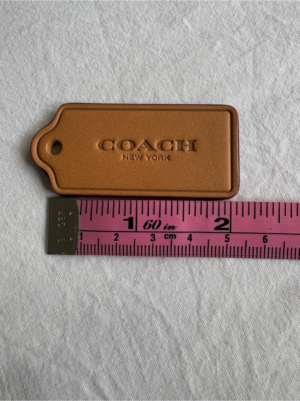 Coach Tan Leather Key/Card Tag with Embossed Logo